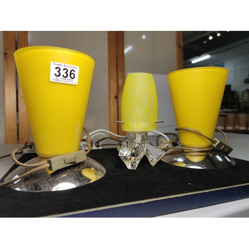 336 - A pair of striking art deco style lamps with conical shaped yellow glass shades along with a similar... 