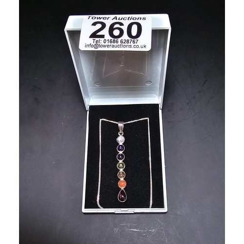 260 - An attractive as new unused multi gemstone pendant on a 16