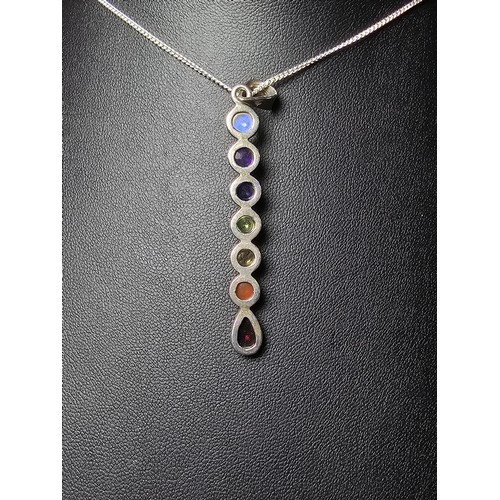 260 - An attractive as new unused multi gemstone pendant on a 16