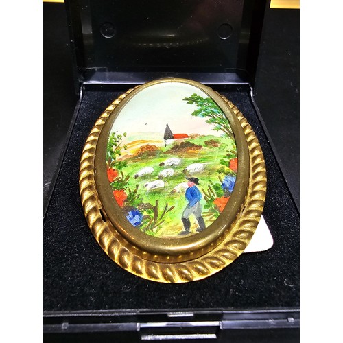 271 - A large early vintage 1940's Welsh Brooch featuring a good hand painted water colour agricultural sc... 