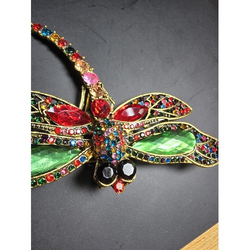 276 - A suite of 7x ornate jewelled dragonfly formed brooches which includes a large ornate multi jewelled... 