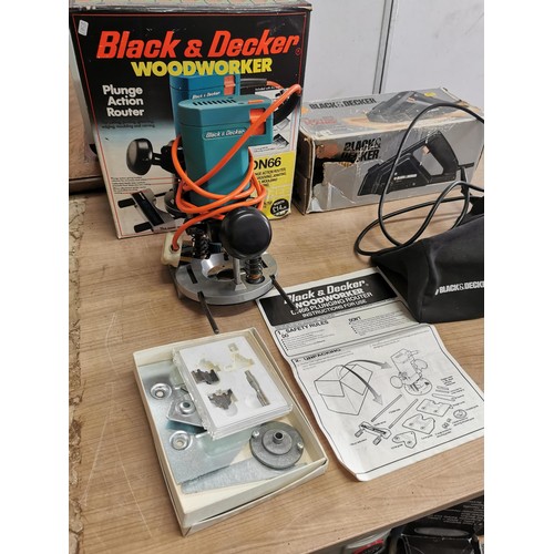 405 - Boxed Black & Decker plunge action router with accessories and instructions along with a boxed Black... 