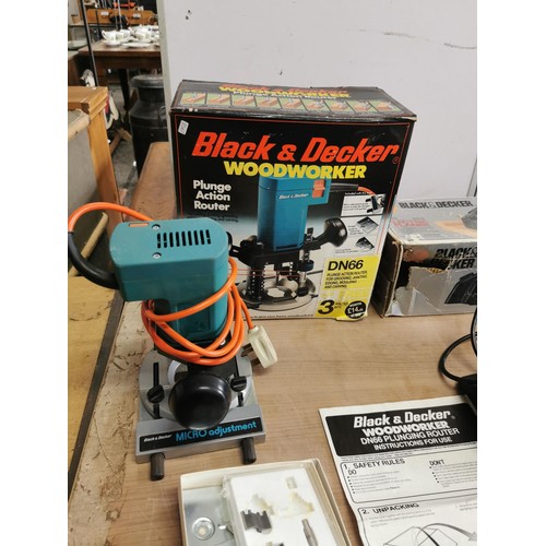 405 - Boxed Black & Decker plunge action router with accessories and instructions along with a boxed Black... 