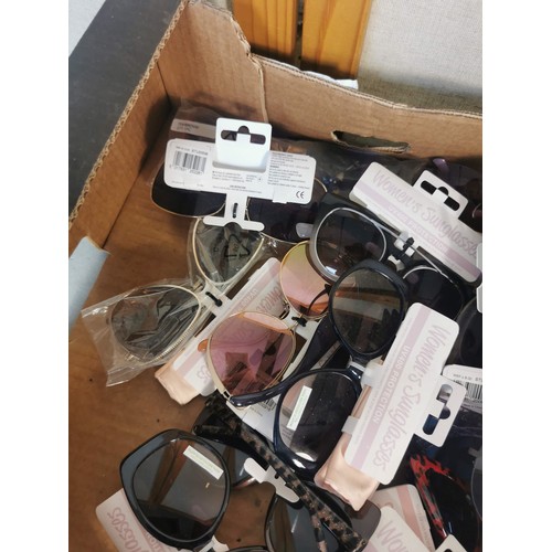 459 - A large collection of various types of brand new and tagged sunglasses, many different styles and de... 