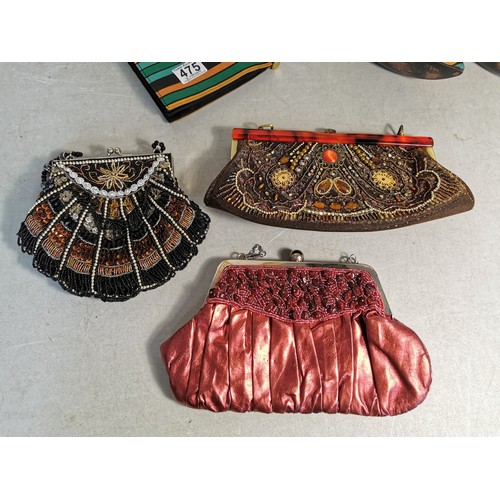 475 - A collection of ornate beaded purses along with a good quality designer brand matching set by Delman... 