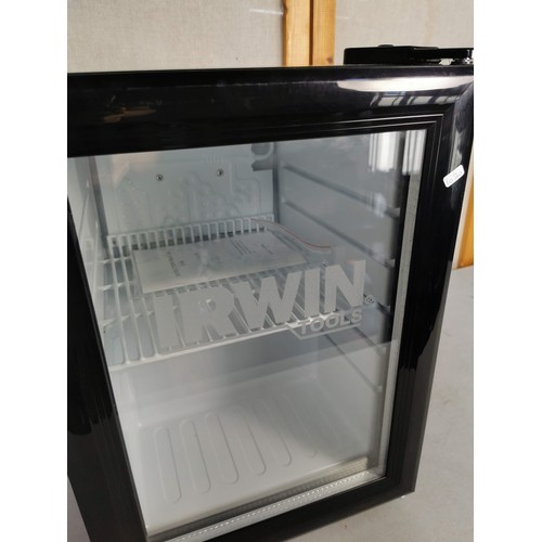 484 - A good quality small tabletop fridge with advertising for Irwin tools, model JGASC21 is of a 21L siz... 