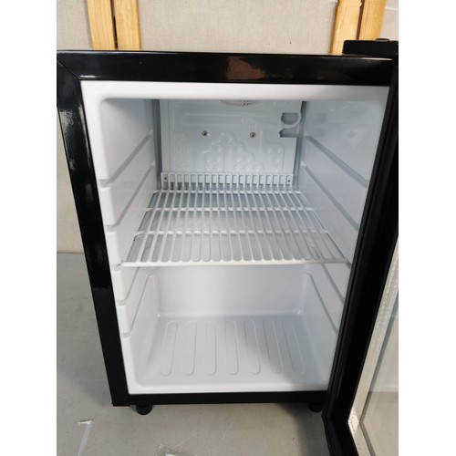 484 - A good quality small tabletop fridge with advertising for Irwin tools, model JGASC21 is of a 21L siz... 