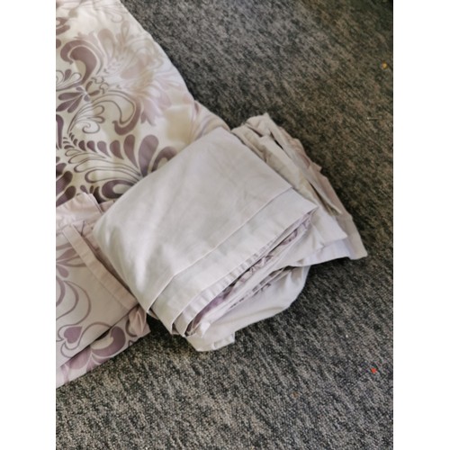 487 - A pair of good quality Laura Ashley lilac curtains along with a matching duvet cover set. All in goo... 