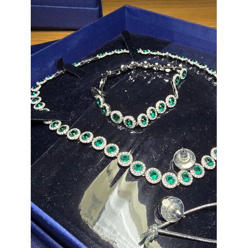 197 - Brand new and boxed Swarovski matching jewellery set which includes necklace, bracelet and stud earr... 