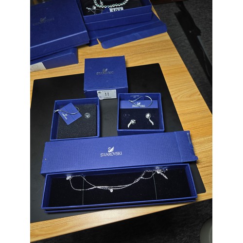 200 - Brand new and boxed Swarovski matching jewellery set which includes necklace and stud earrings featu... 