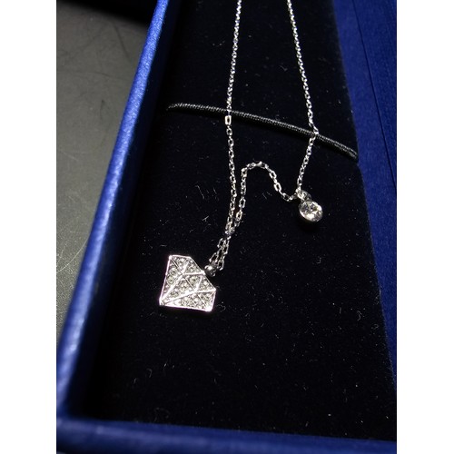 200 - Brand new and boxed Swarovski matching jewellery set which includes necklace and stud earrings featu... 