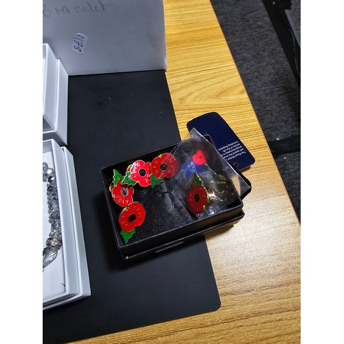 202 - Collection of 5x boxed as new Royal British Legion Remembrance Day jewellery which includes bracelet... 