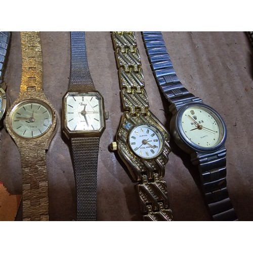 203 - Large collection of 20x various wrist watches along with a vintage powder compact and 3x clocks. Wat... 