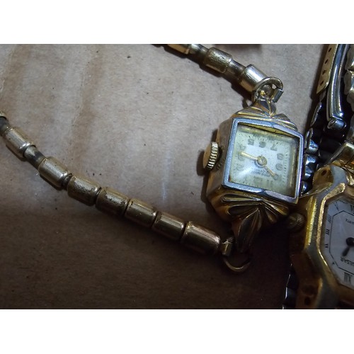 203 - Large collection of 20x various wrist watches along with a vintage powder compact and 3x clocks. Wat... 