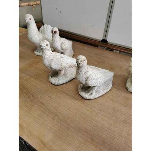 439 - Collection of 5x concrete white doves in concrete all weathered tallest piece measures 25cm