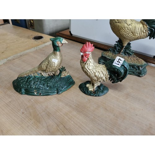 441 - Collection of 4x cast iron door stops inc 3x cockerels and a pheasant in good colours tallest piece ... 