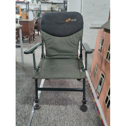 7 - A Cyprinus carp fishing chair with memory foam cushioning and extendable feet.