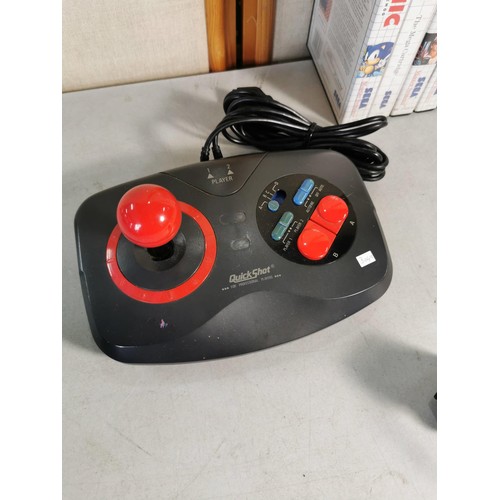 18 - A Rare Sega Master II games console, including controller and a Quickshot Atari Commodore joystick a... 