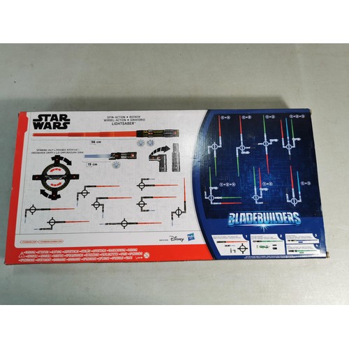 25 - A Boxed as new Star Wars blade builders lightsaber in good condition.