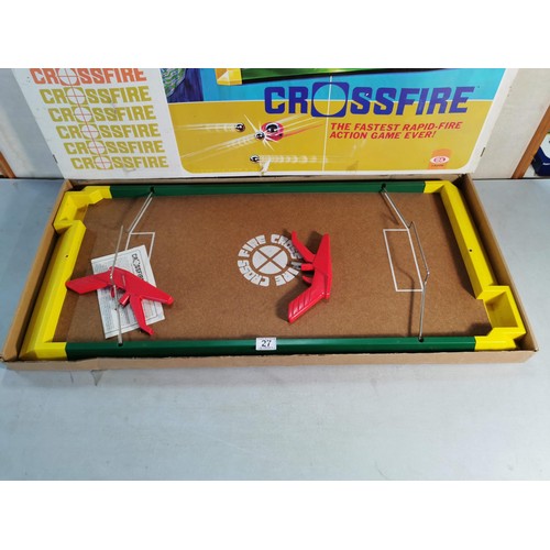 27 - A vintage crossfire game set by Ideal, in good order missing its balls