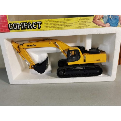 31 - Boxed Komatsu PC 450 LC-6 excavator in box,  diecast toy very well detailed with movable bucket. by ... 