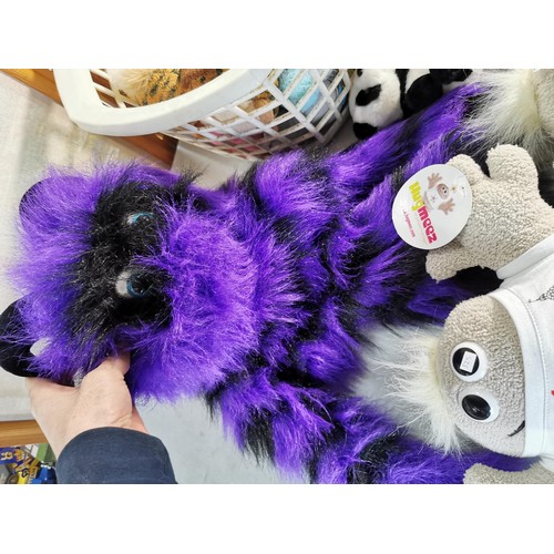 37 - A large quantity of soft plush toys inc 2 Hugmozz hug from Blackpool plushes, a purple and black cat... 