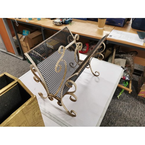 51 - 2x magazine racks, 1 in brass with a tavern scene the other in wrought iron with mesh sides, largest... 
