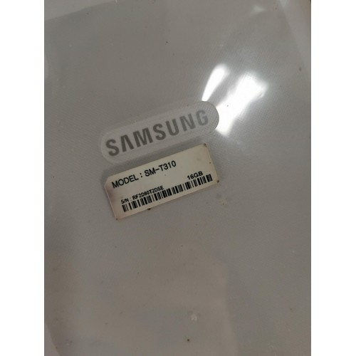 45 - A Samsung SM-T310 mini tablet with charger.