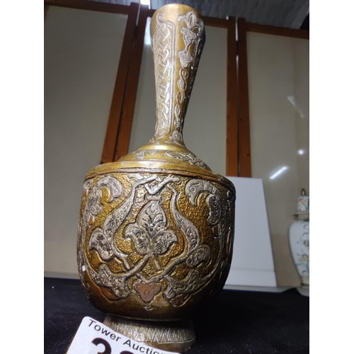 73 - A good quality antique Cairo ware inlaid brass vase, inlaid with real silver and copper featuring an... 