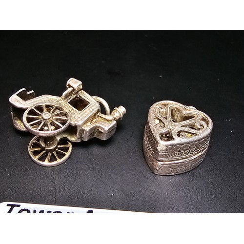 286 - 2 good quality vintage tested as sterling silver charms for a charm bracelet which includes a silver... 