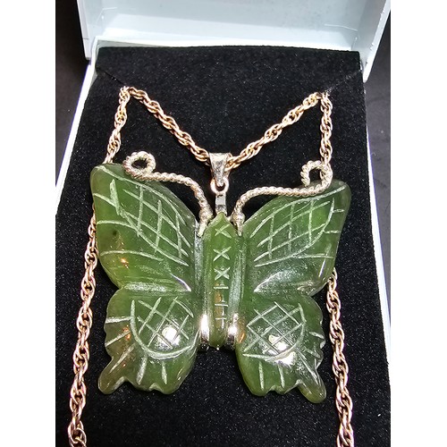 307A - A good quality vintage genuine nephrite jade carved butterfly pendant with overlaid silver antennae ... 