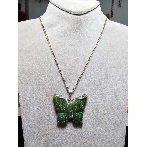 307A - A good quality vintage genuine nephrite jade carved butterfly pendant with overlaid silver antennae ... 