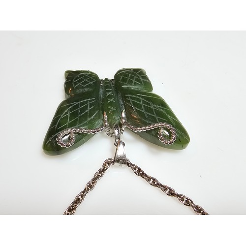 307A - A good quality vintage genuine nephrite jade carved butterfly pendant with overlaid silver antennae ... 