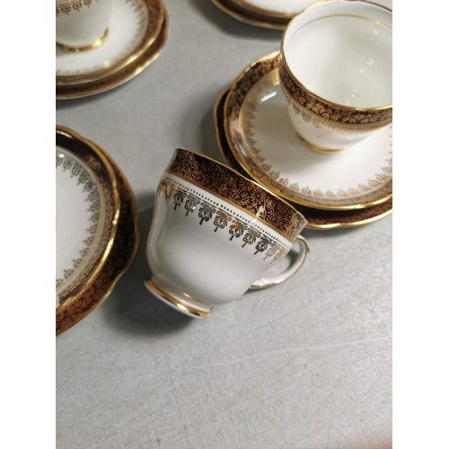 84 - 29 piece part teaset by Duchess fine bone china with red floral pattern and gilding to the edges, se... 