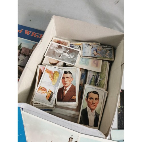 90 - A quantity of various ephemera to include a large quantity of cigarette cards and various maps of th... 