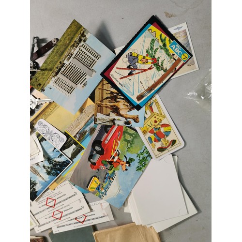 91 - A large quantity of various ephemera to include vintage postcards, a quantity of postcard/photo slee... 