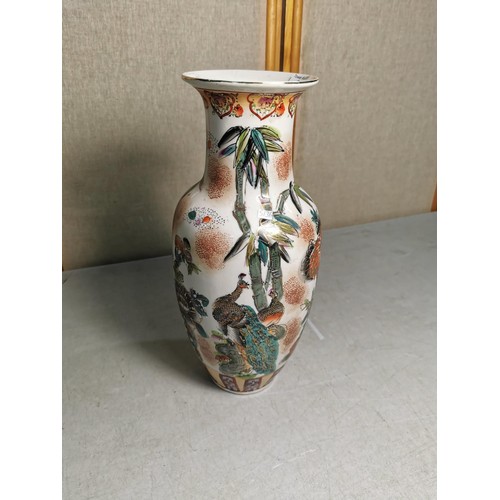 92 - A large antique Chinese hand painted vase featuring a colourful peacock design, no sign of any chips... 