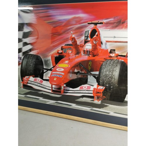 78 - Large framed and glazed print of 7x World Champion Michael Schumacher in a Ferrari Formula One Car w... 