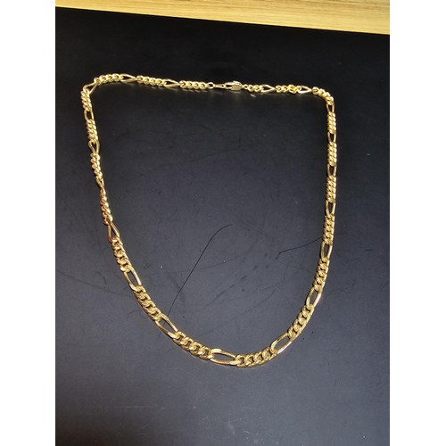 191 - A good unused 18ct gold plated neck chain with a figaro link design, complete with presentation box,... 