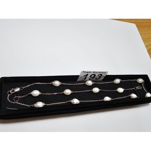 193 - A good quality 925 silver matching jewellery set which includes a pearl necklace and matching bracel... 