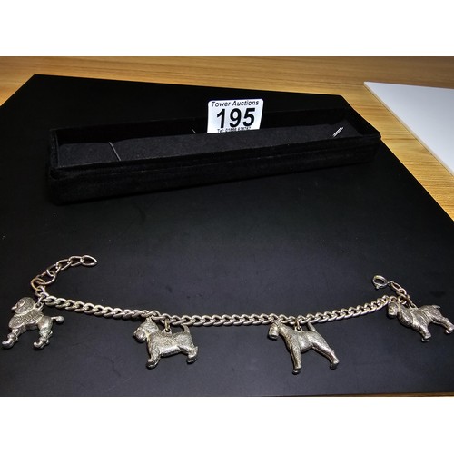 195 - An unusual silver plated charm bracelet featuring 4x well cast silver plated dog charms, each dog ch... 