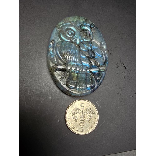 321 - A beautiful natural labradorite carved owl plaque presenting excellent natural flashing colours thro... 