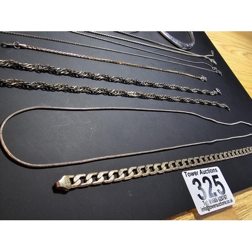 325 - A large collection of various silver plated items which includes 2 good pocketwatch chains, a curb l... 