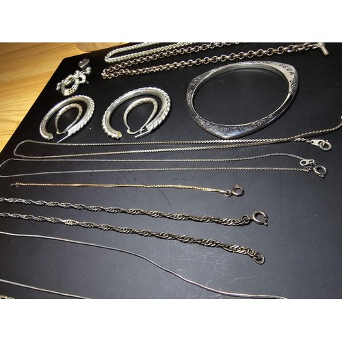 325 - A large collection of various silver plated items which includes 2 good pocketwatch chains, a curb l... 