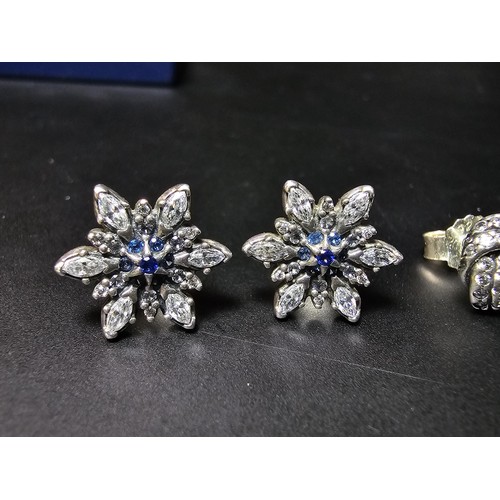 198 - 2 pairs of genuine Pandora 925 silver earrings, 1 pair is in star form with clear and blue crystals,... 