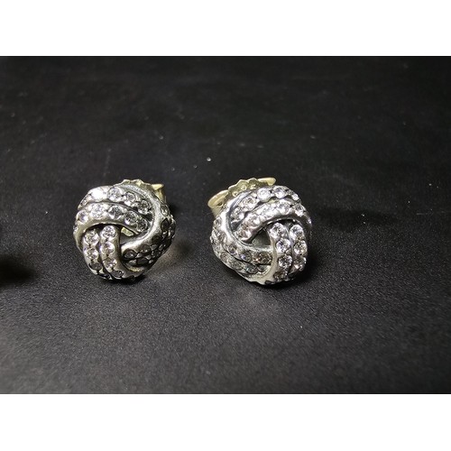 198 - 2 pairs of genuine Pandora 925 silver earrings, 1 pair is in star form with clear and blue crystals,... 