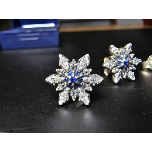 198 - 2 pairs of genuine Pandora 925 silver earrings, 1 pair is in star form with clear and blue crystals,... 