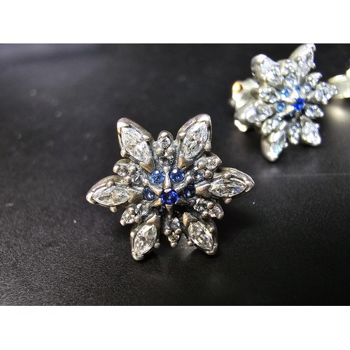 198 - 2 pairs of genuine Pandora 925 silver earrings, 1 pair is in star form with clear and blue crystals,... 