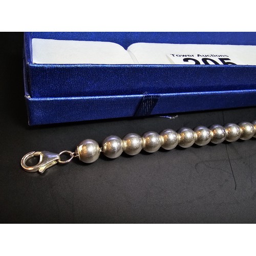 205 - A good quality heavy 925 hallmarked silver large ball beaded bracelet, in new and unused condition a... 