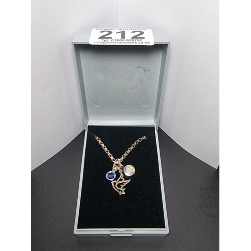 212 - A pretty 925 silver bracelet with 3 silver charm drops which includes a bird charm, a blue crystal c... 